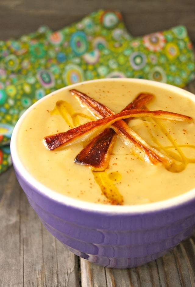 Creamy Parsnip Soup with Baby Parsnip French Fries in a purple bowl