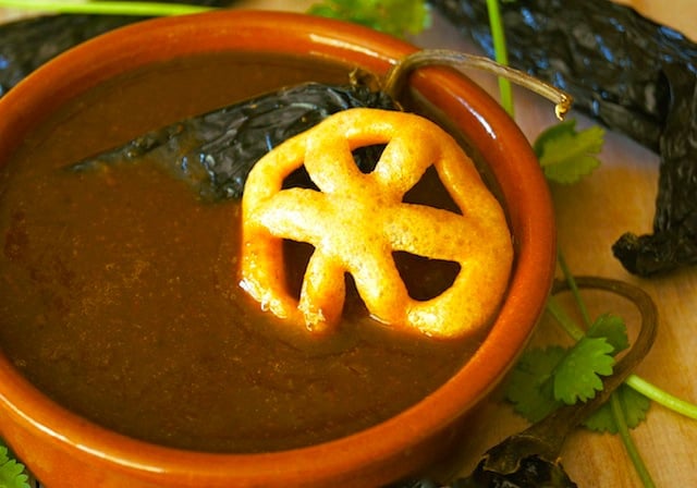 Smoky Poblano Enchilada Sauce and Pasta Duros in a terra cotta bowl