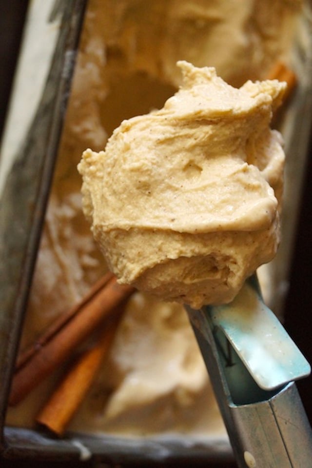 One scoop of cinnamon ice cream in a blue scoop