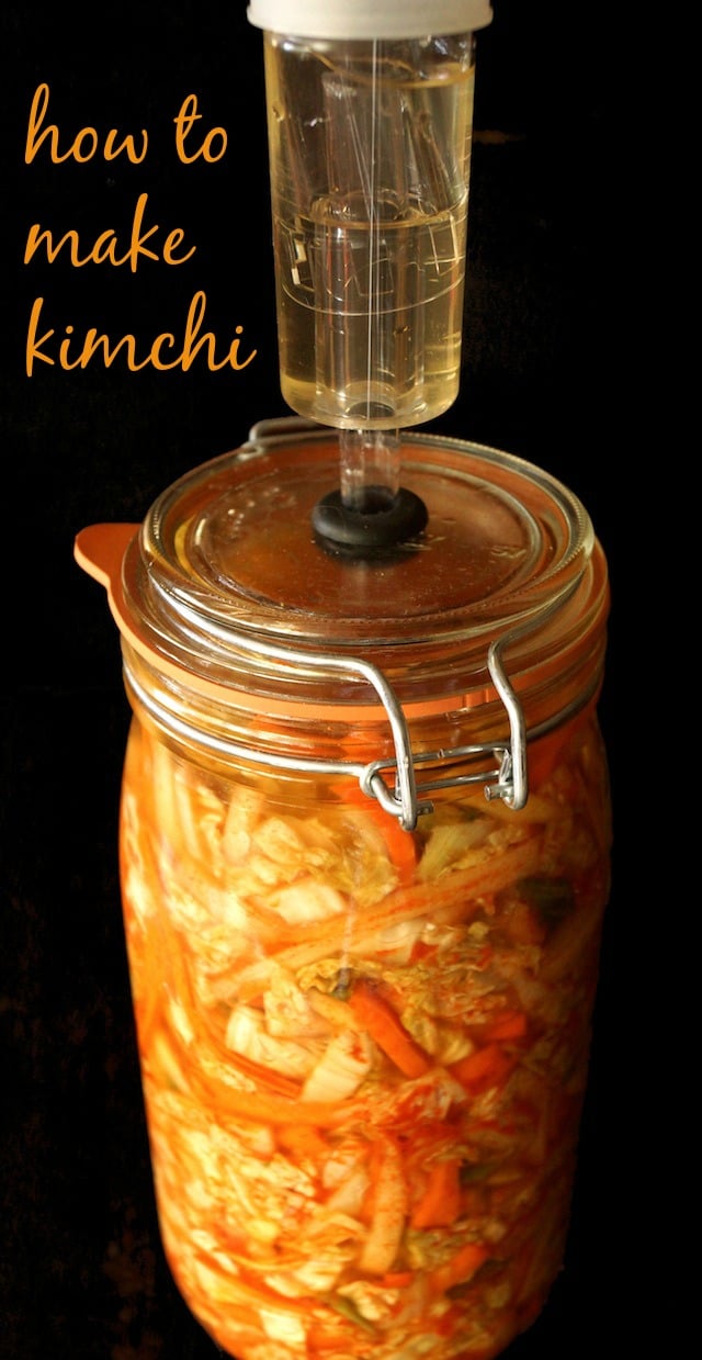 Kimchi in a tall jar.