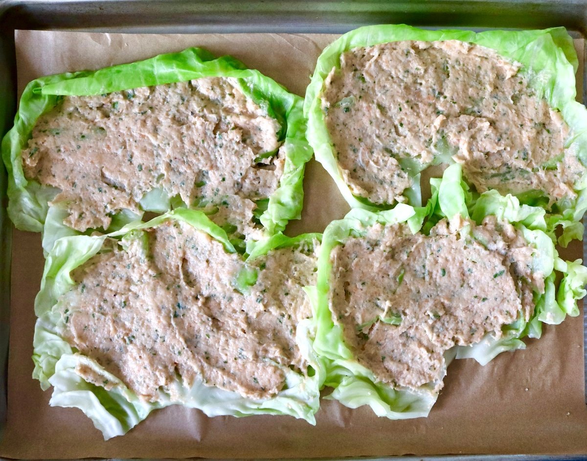 Salmon-and-Cabbage-Recipe Four cabbage leaves spread with salmon mousse.