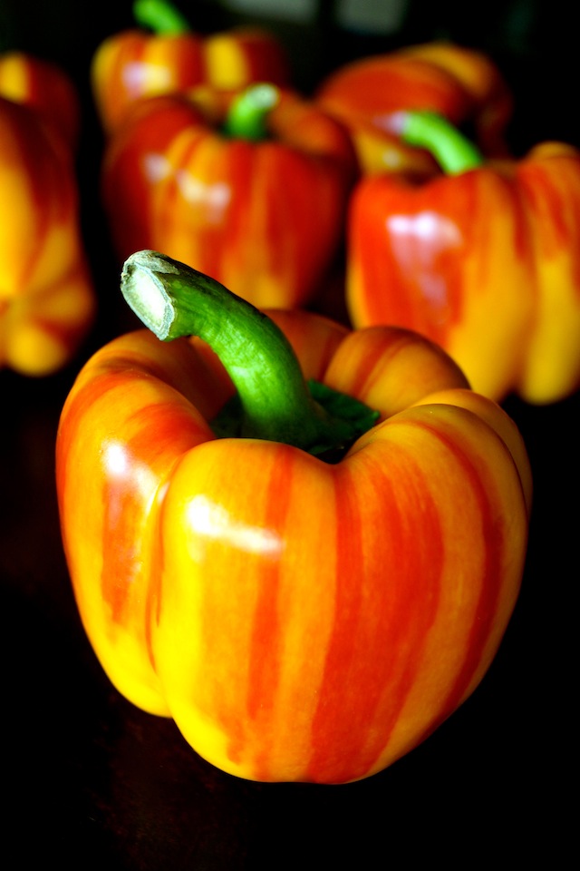 serveral Enjoy peppers with black background