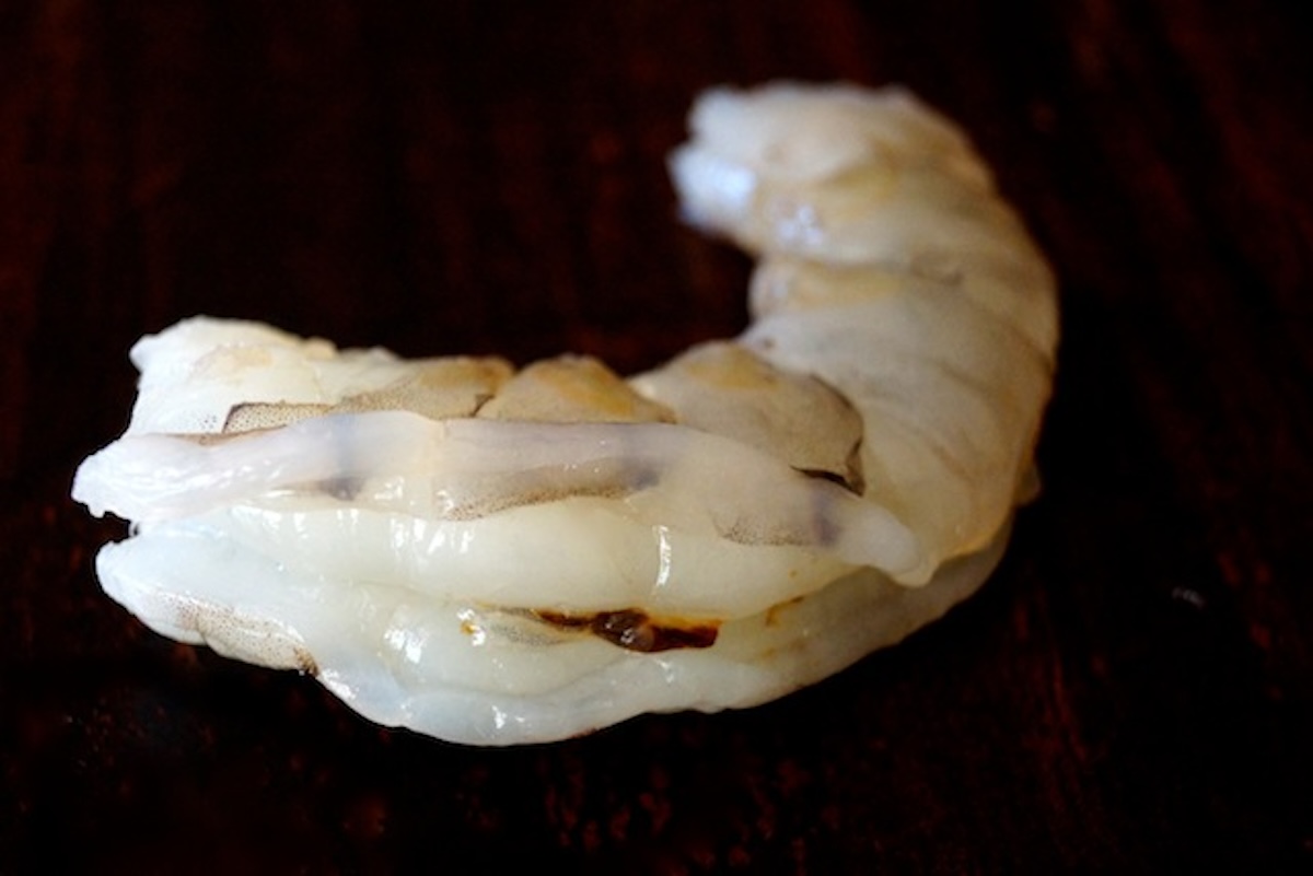 Raw shrimp revealing a bit of the black vein.