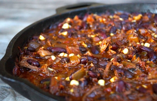 Brisket Chili with bacon and chipotles in a cast iron skillet.