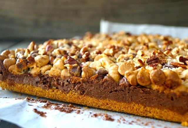 Peanut Butter Seven Layer Magic bars, in one whole piece, side view