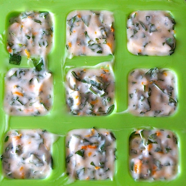 Orange-Basil Butter in a green ice cube tray.