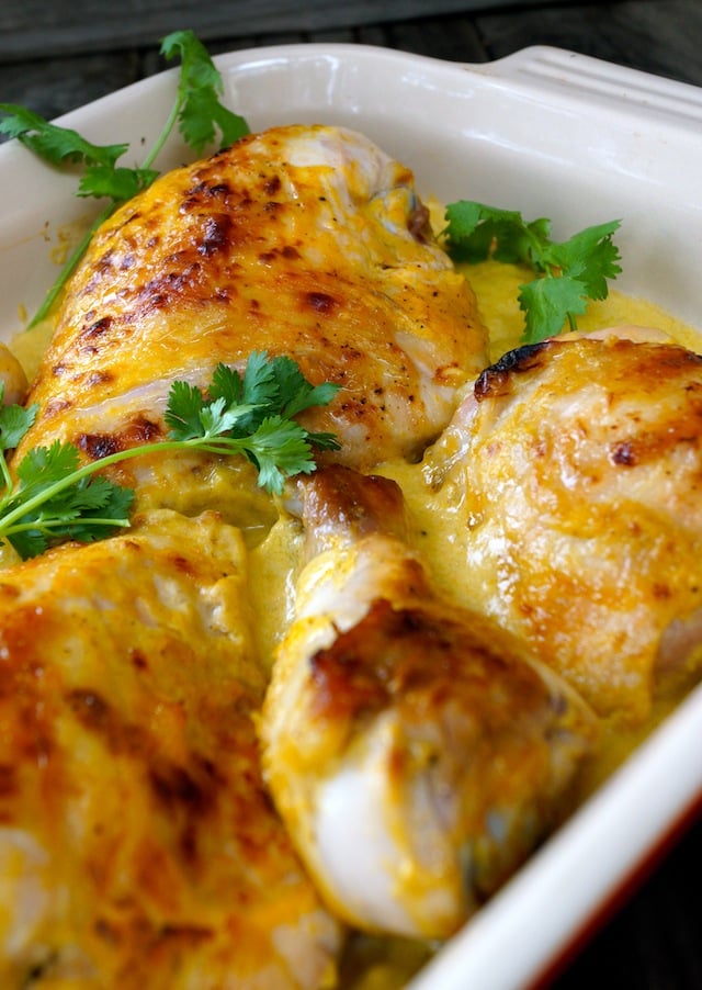 Baked Coconut Mango Chicken Recipe in a white baking dish.