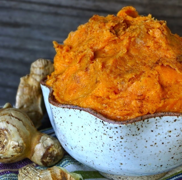 Ginger Mashed Sweet Potatoes Recipe - This quick and easy sweet potato side dish is perfect for fall and lovely for Thanksgiving! It's creamy, rich and packed with warm flavors.