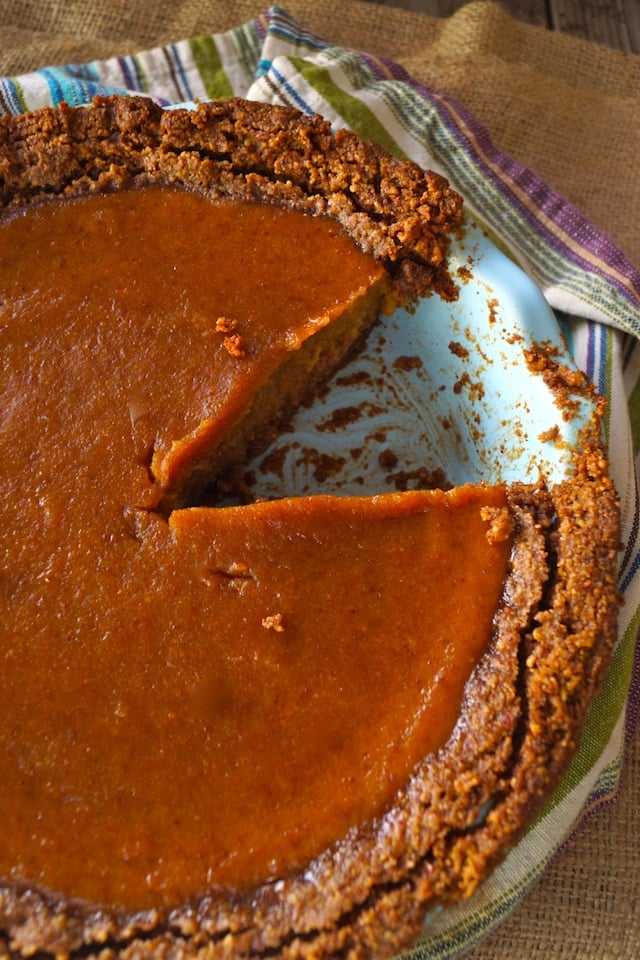 Whole Butternut Squash Pie with gluten free nut crust with one slice removed