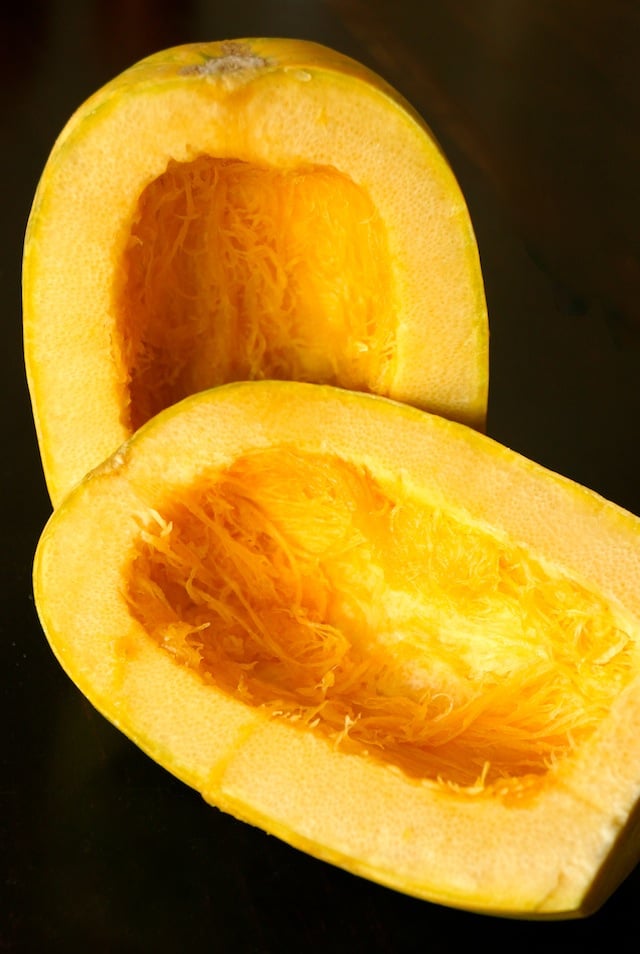 two spaghetti squash halves with seeds removed