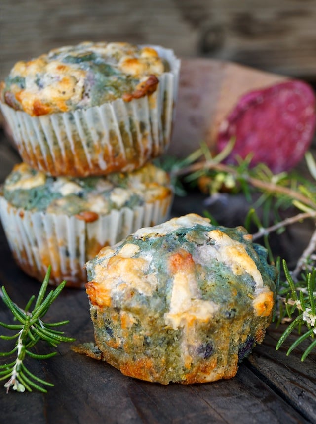 Purple Sweet Potato Muffins Recipe that have turned greed, with fresh rosemary springs on wood background.