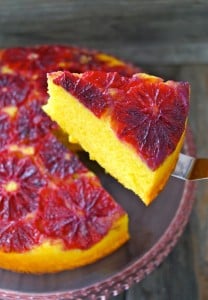 Slice being removed from Blood Orange Turmeric Pound Cake