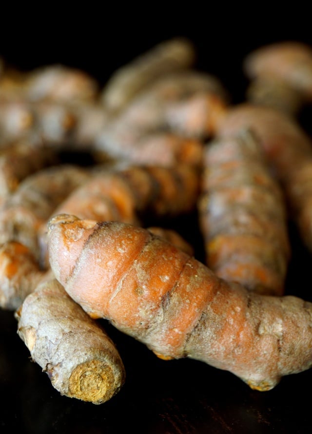 Several pieces of fresh turmeric