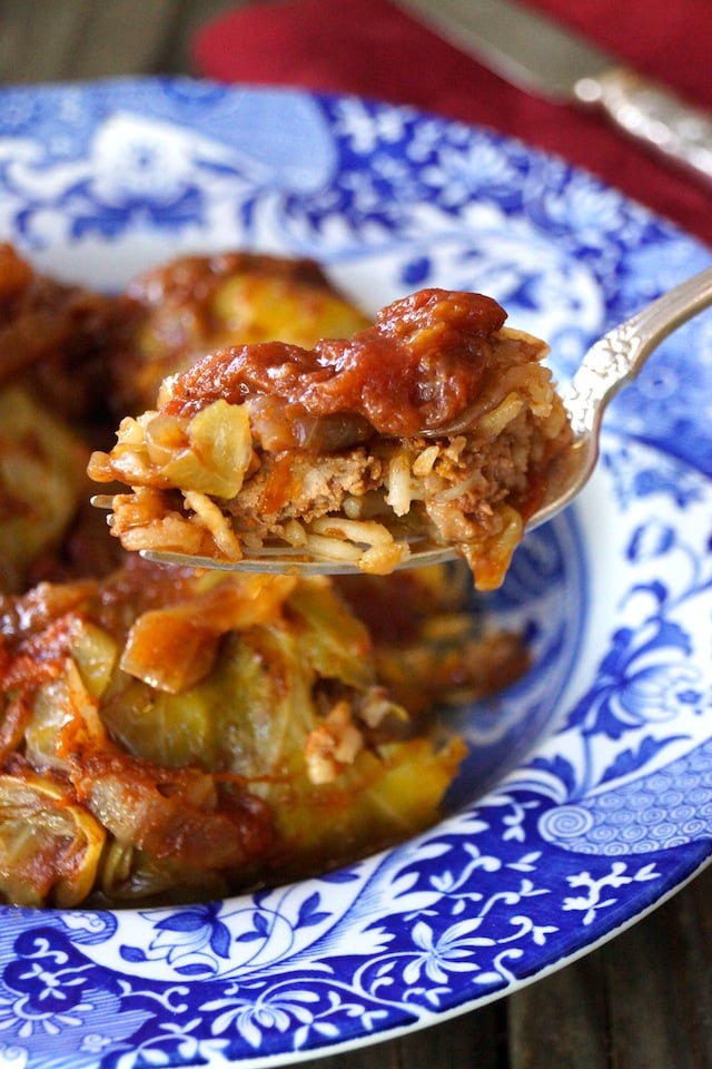 One bite of Stuffed Cabbage Recipe with Tomato on a fork