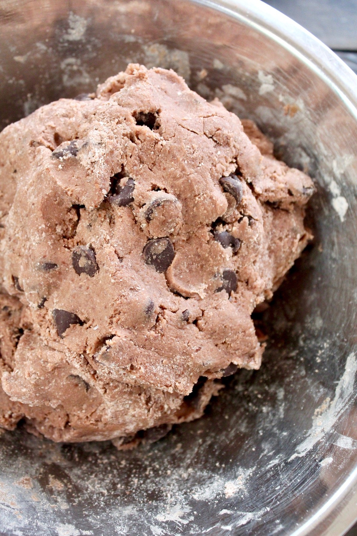 gluten-free chocolate biscotti dough in stainless steel bowl