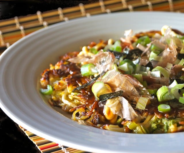 Yakisoba Omelet Okonomiyaki in a white bowl