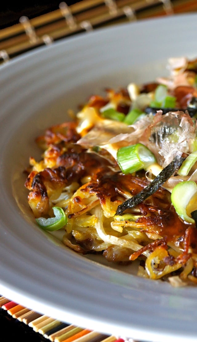 Close up of Yakisoba Okonomiyaki in white bowl