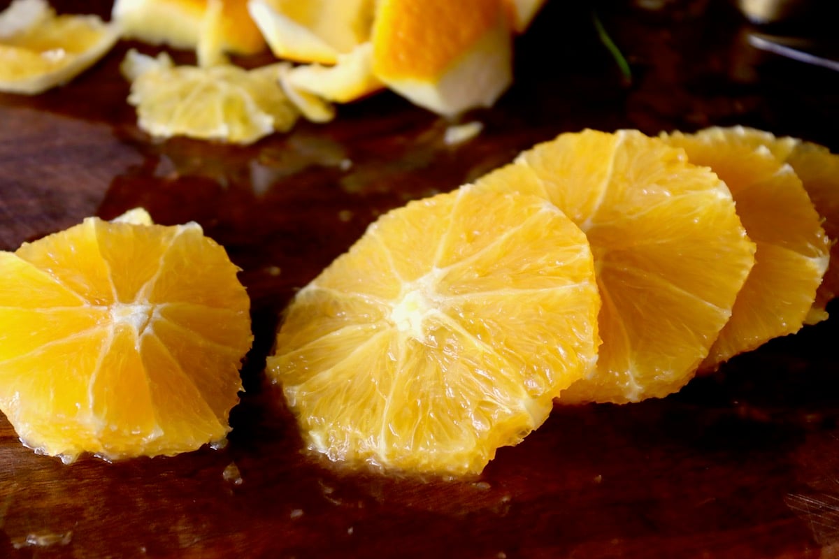 Peeled orange sliced in rounds.
