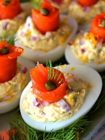 smoked salmon deviled eggs on silver tray