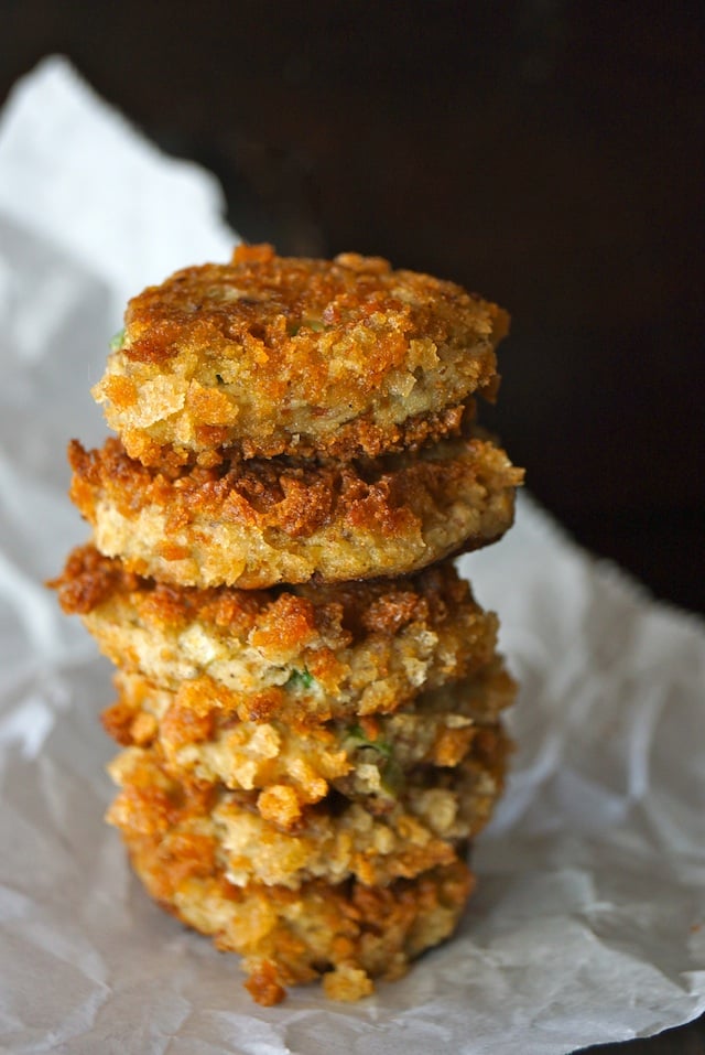 tall stack of eggplant cakes on parchment