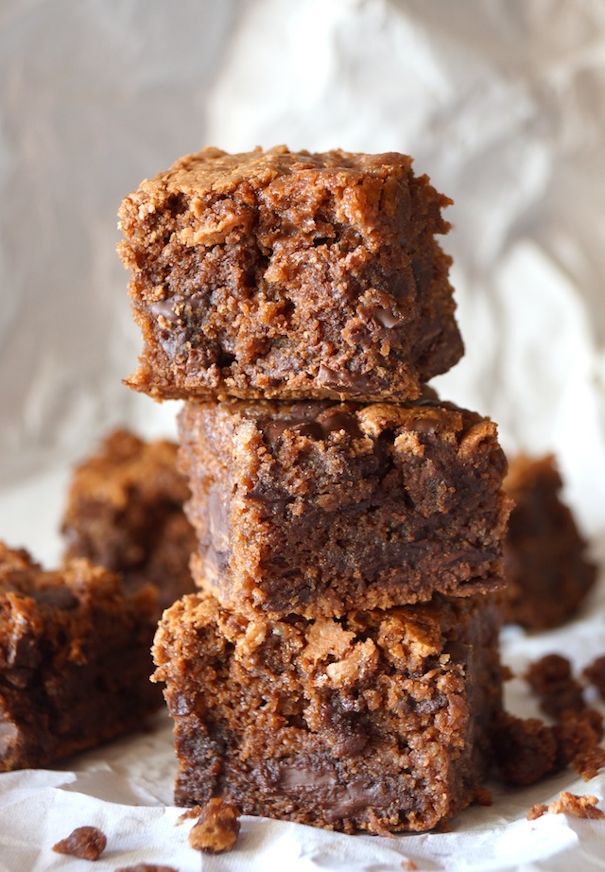 Gluten-Free-Brownie-Cake-Recipe Three chunky stacked brownies.