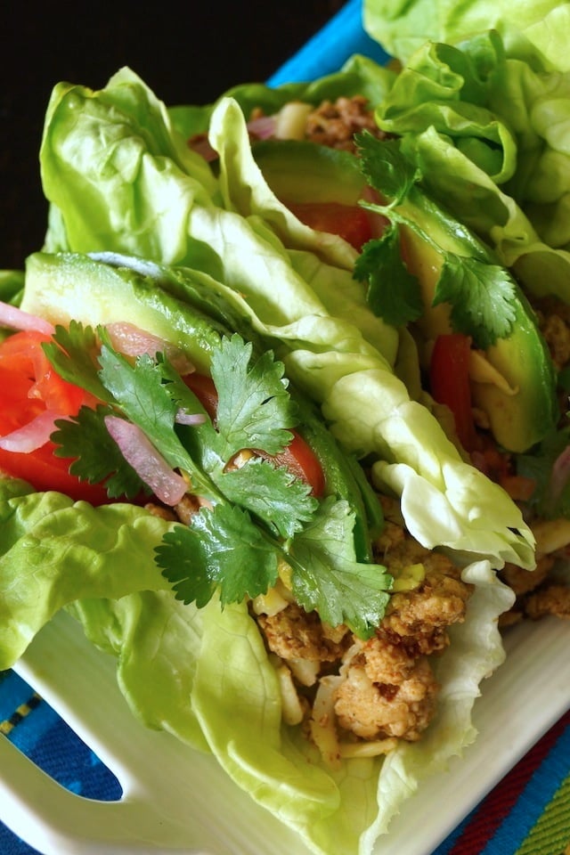 Close up of 2 Pepper Jack Turkey Lettuce Tacos with cilantro on top.