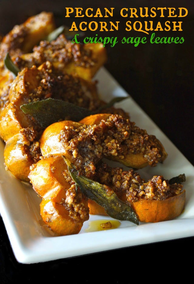 A few slices of Roasted Spicy Pecan Crusted Acorn Squash on a white plate