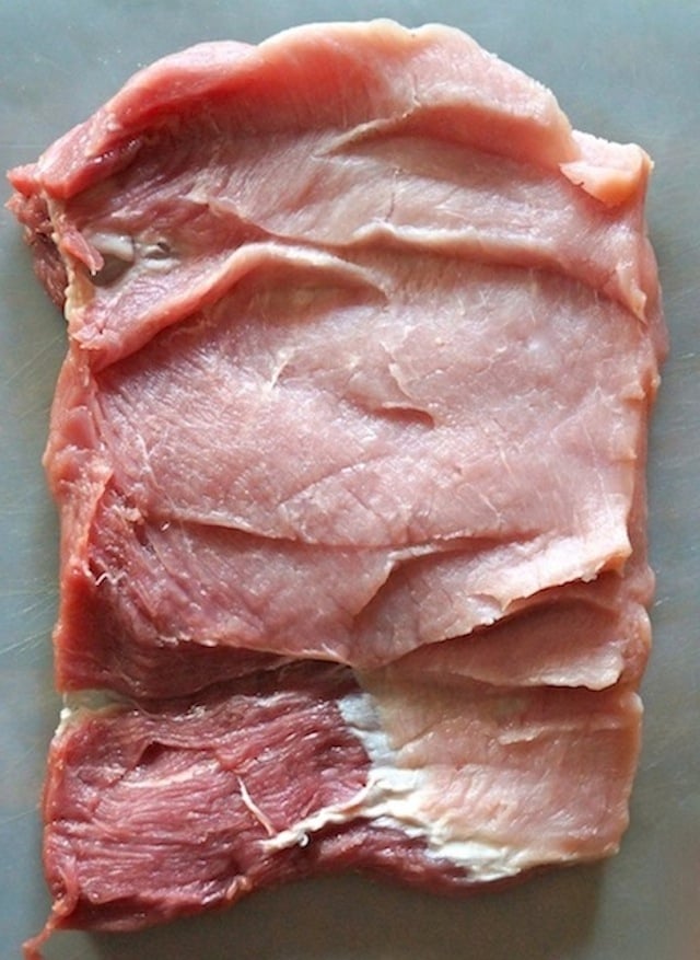 butterflied raw pork loin