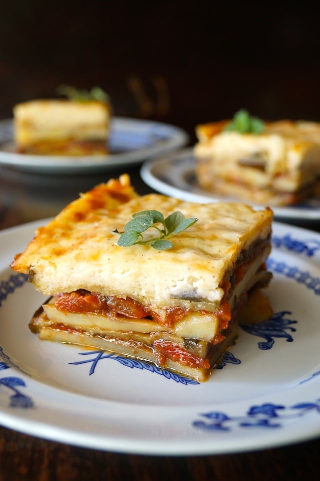 three plates with slices of Potato Moussaka, from Raghavan Iyer's cookbook, Smashed, Mashed, Boiled and Baked