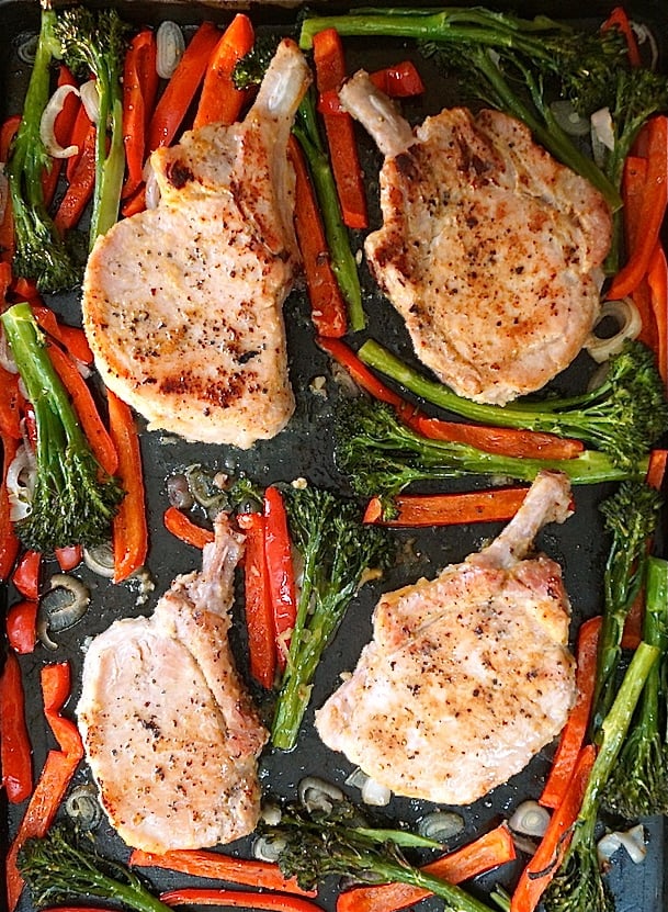 Sheet Pan Miso Glazed Pork Chops with Broccolini right out of the oven, still on the pan.