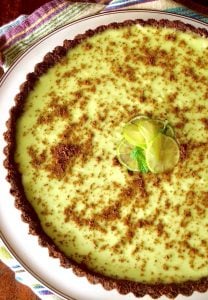 Thin Mint Key Lime Tart Recipe -- A minty Key lime custard in a Girl Scout Thin Mint cookie crust. This fresh, creamy dessert is beautiful, unique and oh-so-tasty!
