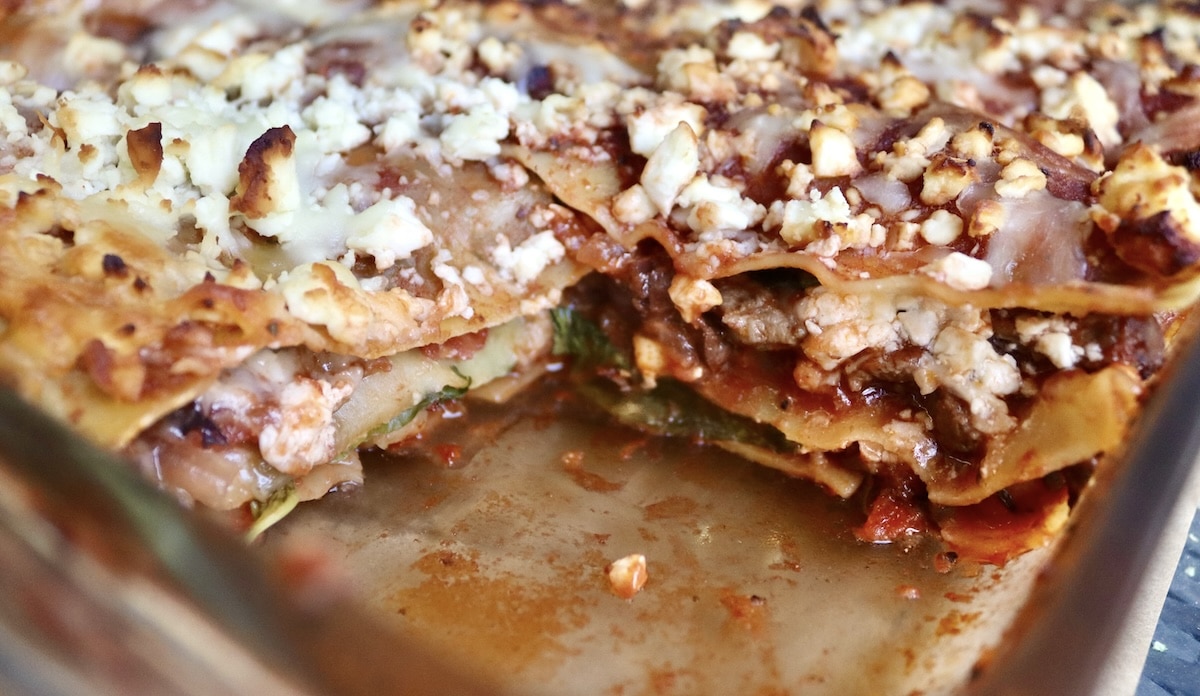 Lamb-Lasagna-Recipe 9 x 13 pyrex with lamb lasagna, with the corner piece removed.