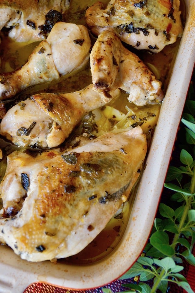 Oregano-Lemon Butter Braised Chicken in a baking dish