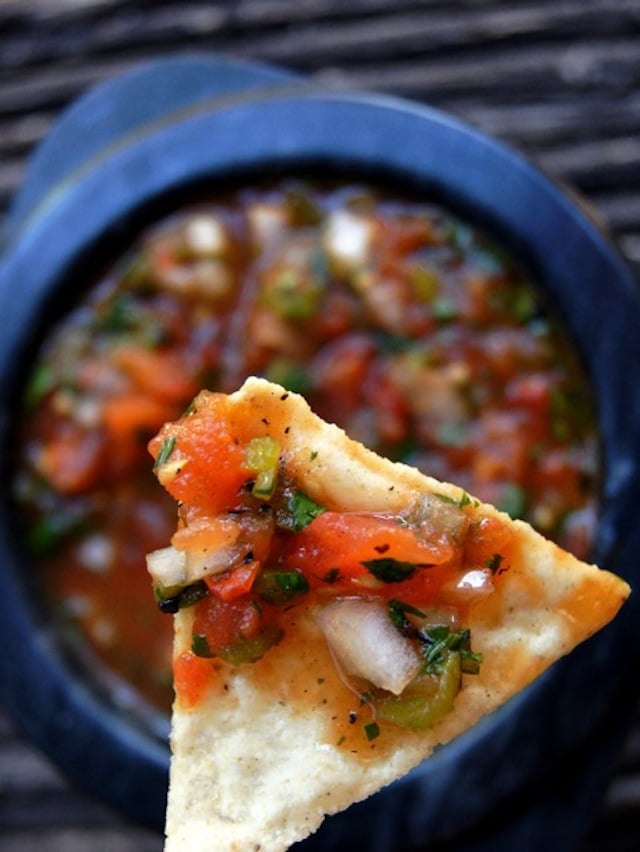 Roasted tomato Poblano salsa on a chip