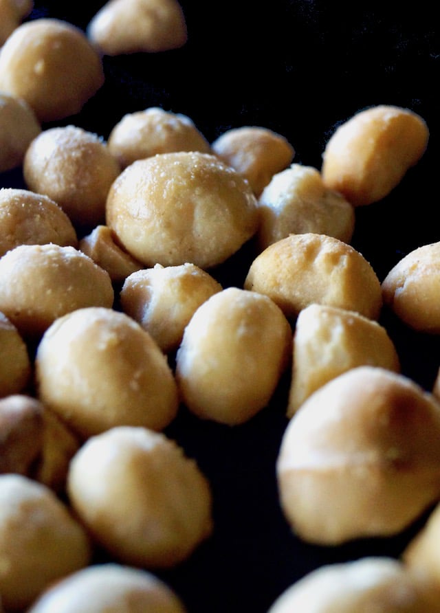 roasted macadamia nuts on sheet pan