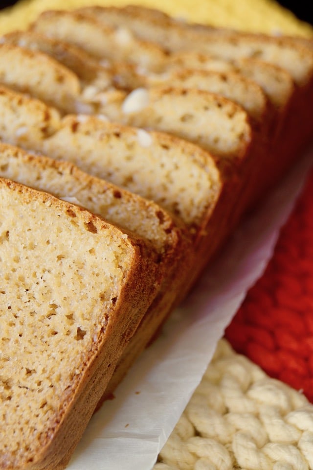 Gluten-Free Macadamia Honey Bread, sliced on parchment