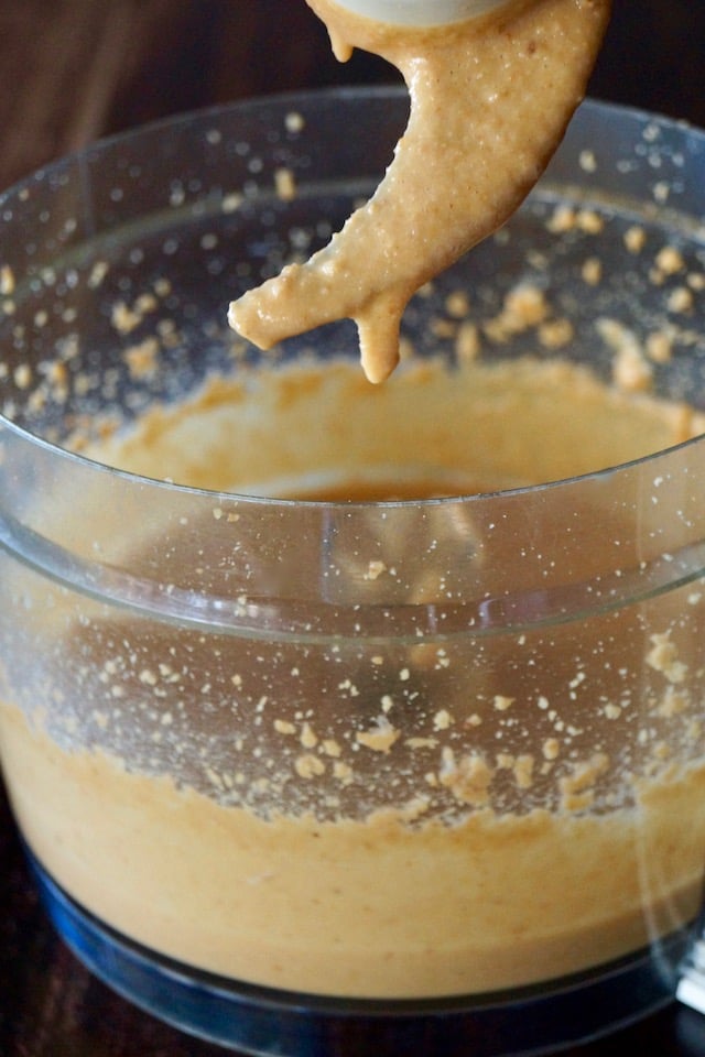 macadamia nuts blended into a butter in food processor