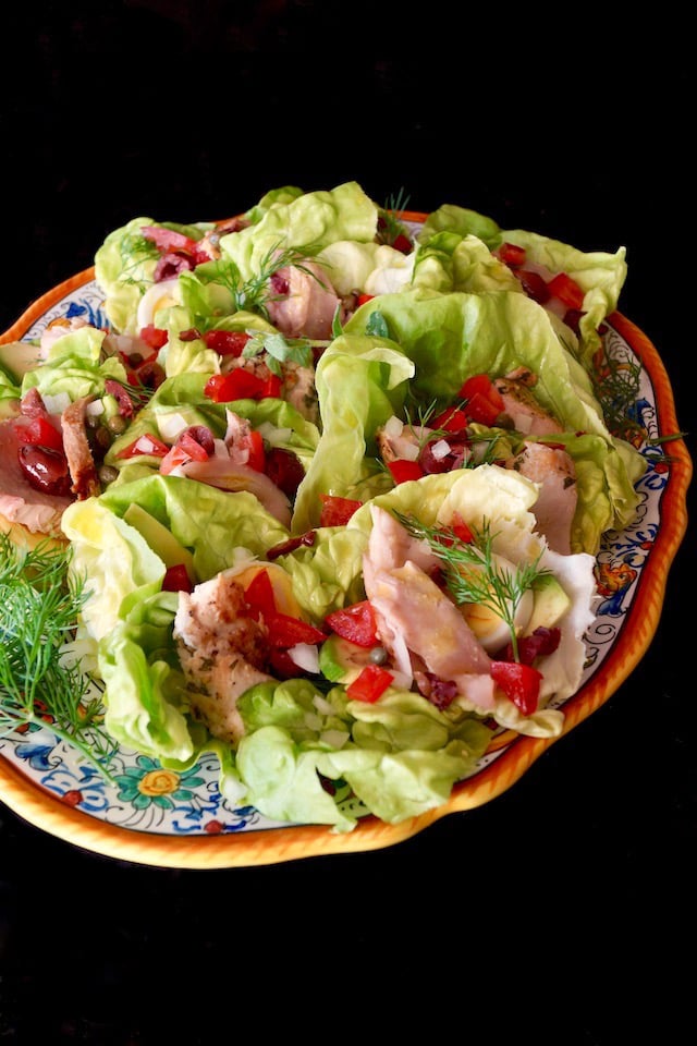 Italian, gold-rimmed platter with Albacore Nicoise Salad Cups.