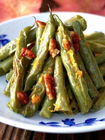 Small white and blue plate with Pecan Green Beans.