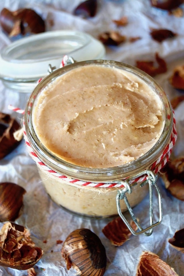 chestnut butter in a jar with red and white twine around it