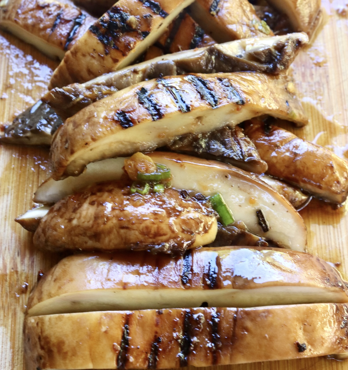 Marinated-Grilled-Portobello-Mushrooms Thickly sliced grilled and marinated portobello mushrooms.
