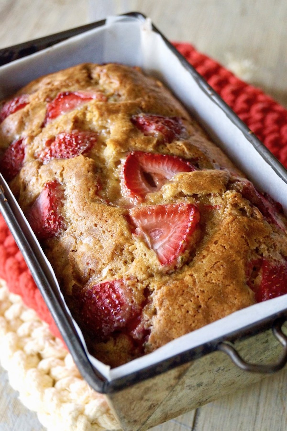 Baked Strawberry Rosemary Cake baked in loaf pan.