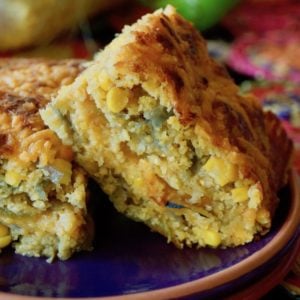 two piced of hatch chile cornbread on a purple plate