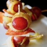 Grape Appetizer on a toothpick with chorizo and cheese.