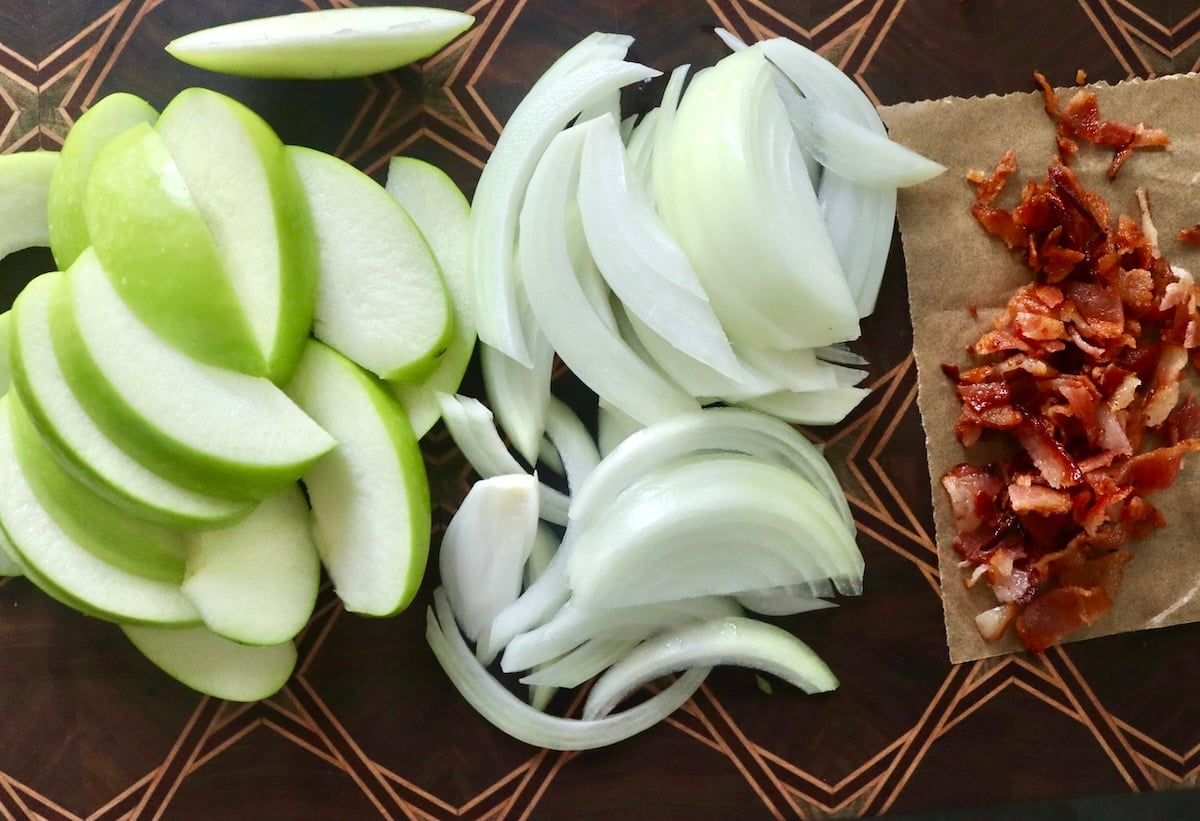 Sliced green apples, onions and crumbled cooked bacon.