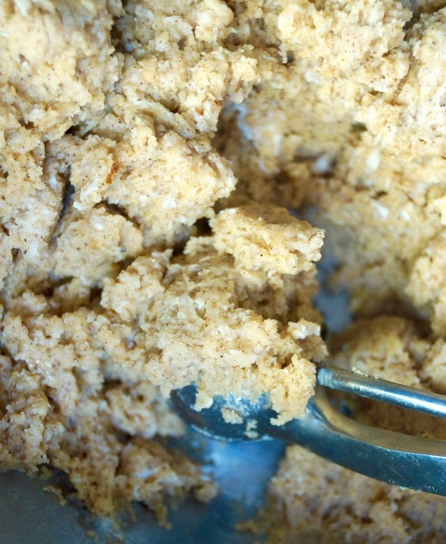 Close up of raw dough for Air Fried Pumpkin Spice Glazed Donut Holes, in a bowl.