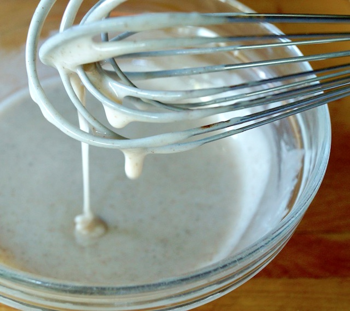 Spiced creamy glaze for pumpkin donut holes made in air fryer.