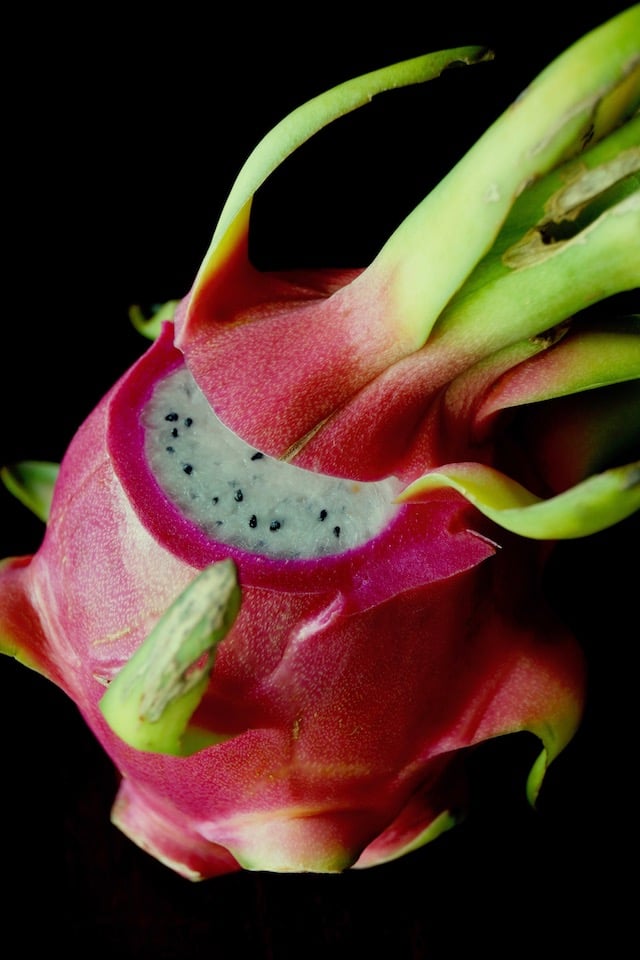One dragon fruit with top halfway cut off