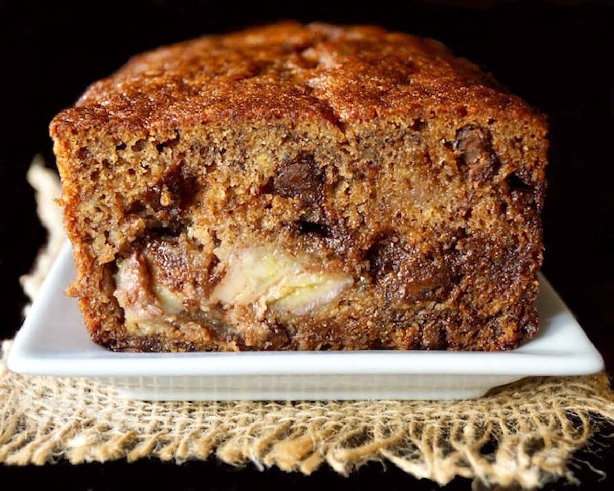Gluten-Free-Banana-Chocolate-Chip-Cake Close up, cross section of a loaf of banana cake with chocolate chips.