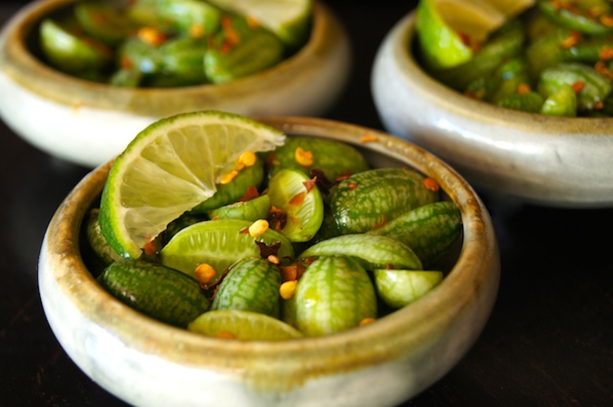 Ponzu-Marinated-Cucamelon-Recipe A few small bowls filled with cucamelons.